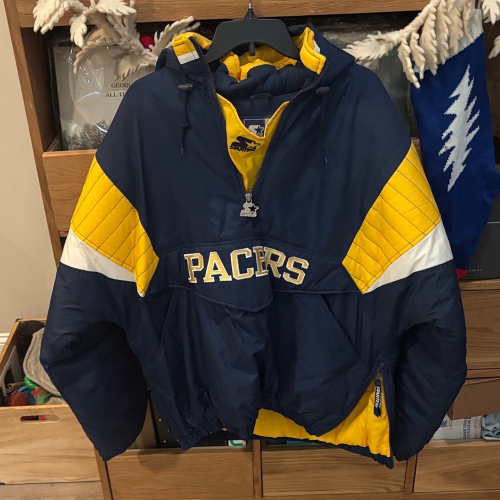Vintage 90’s Indiana Pacers STARTER puffer jacket.